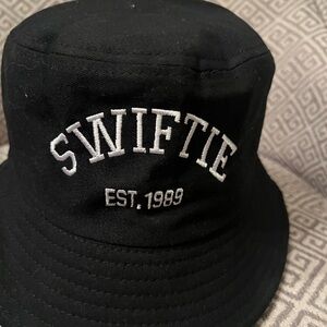 SWIFTIE Bucket Hat Black w/ White embroidered lettering Adjustable draw string.